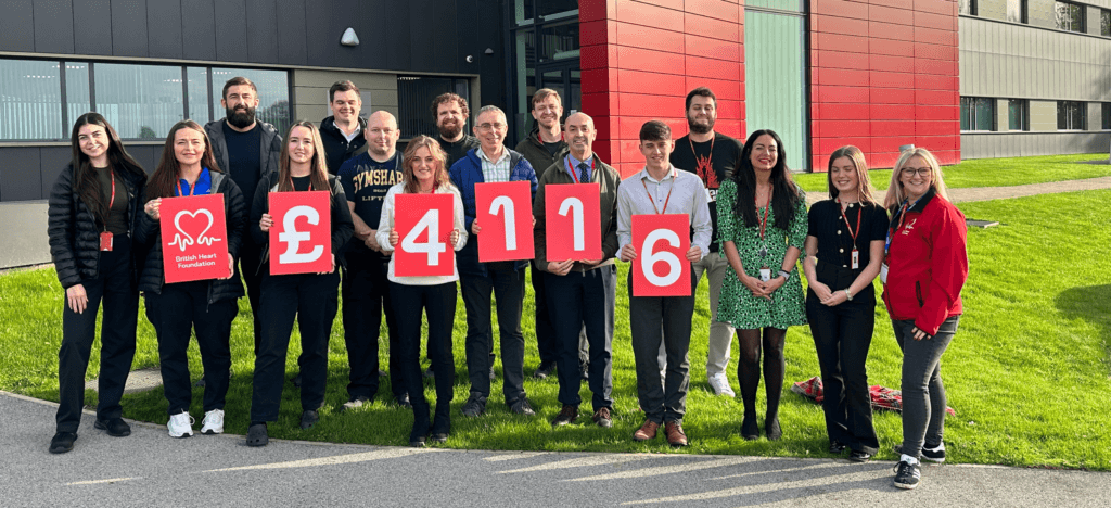 Team AHK celebrates raising over £4000 for the British Heart Foundation at their Liverpool headquarters.