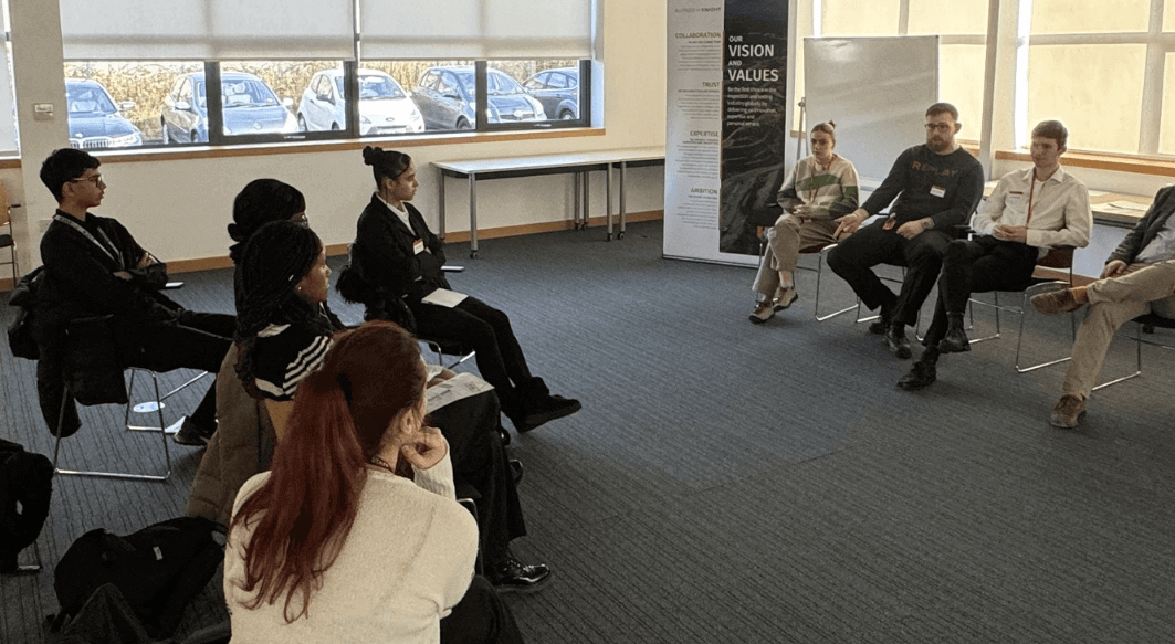 AHK colleagues, Maya Killcross, Aaron Dunne and Jenson Sadler, giving a speech to UTC next generation of scientists